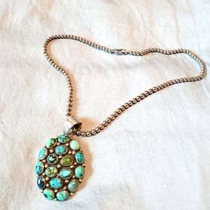 R TOM NAVEJO TURQUOISE NECKLACE, STERLING SILVER PENDENT